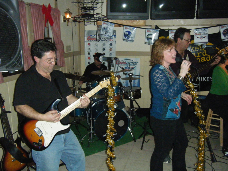 Dona performing at Gail's Place