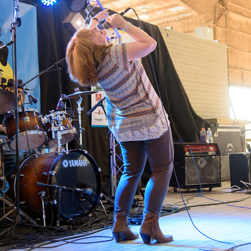 Dona rocking the stage at Boxerstock Music Festival in Atlanta, GA